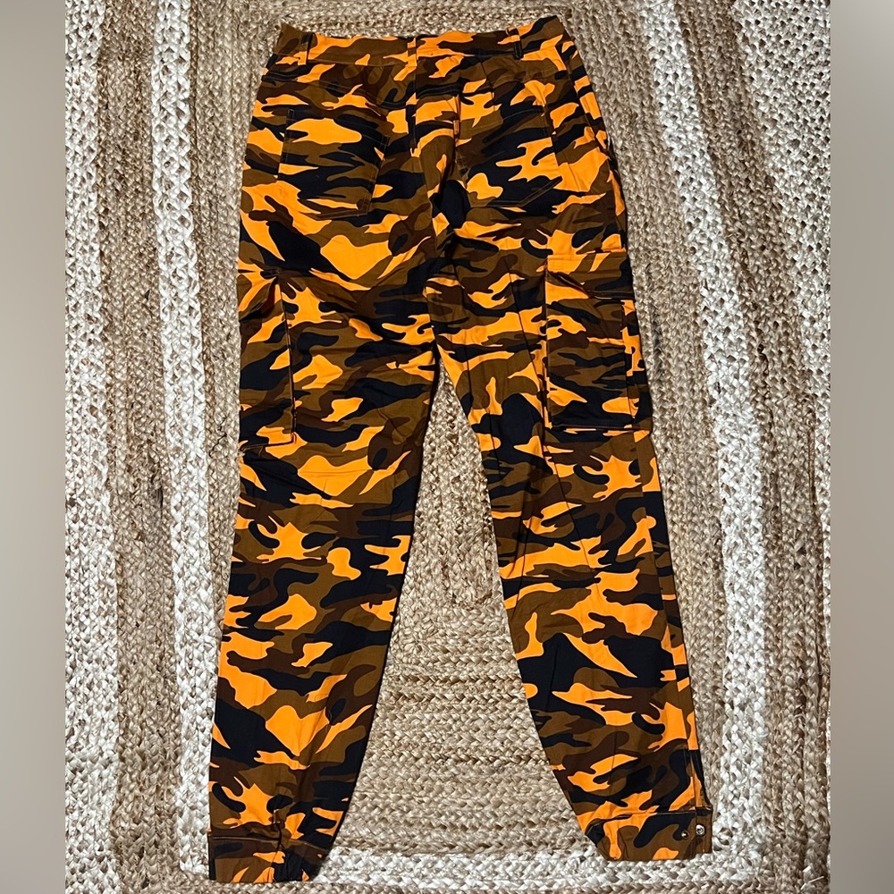 Celebrity fashion orange camo pants